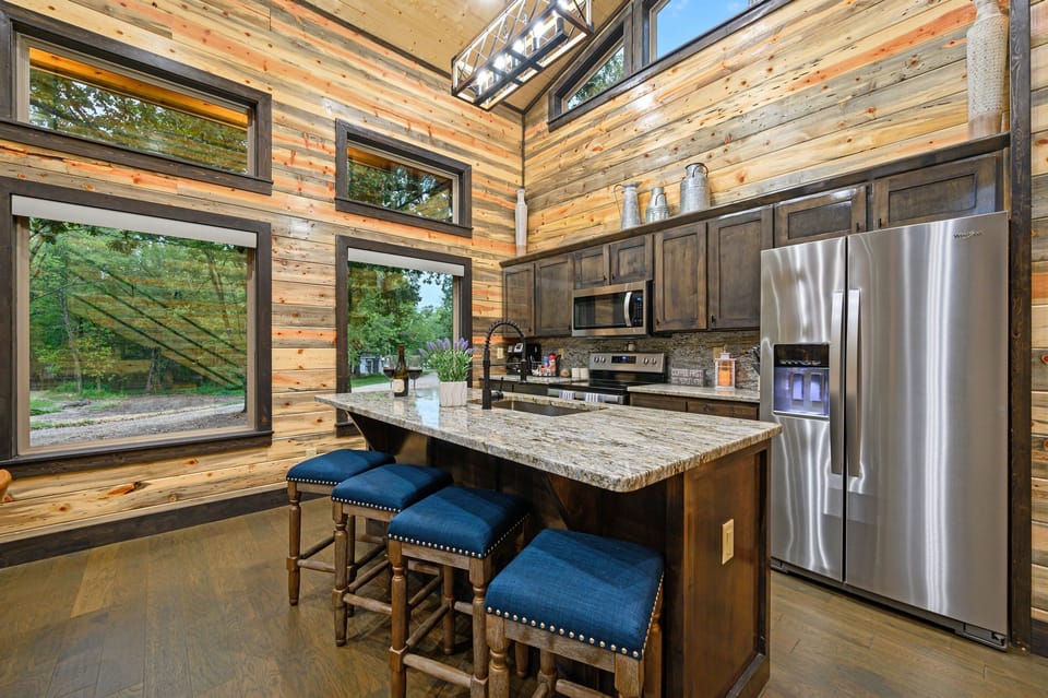 kitchen with beautiful tree and nearby pond