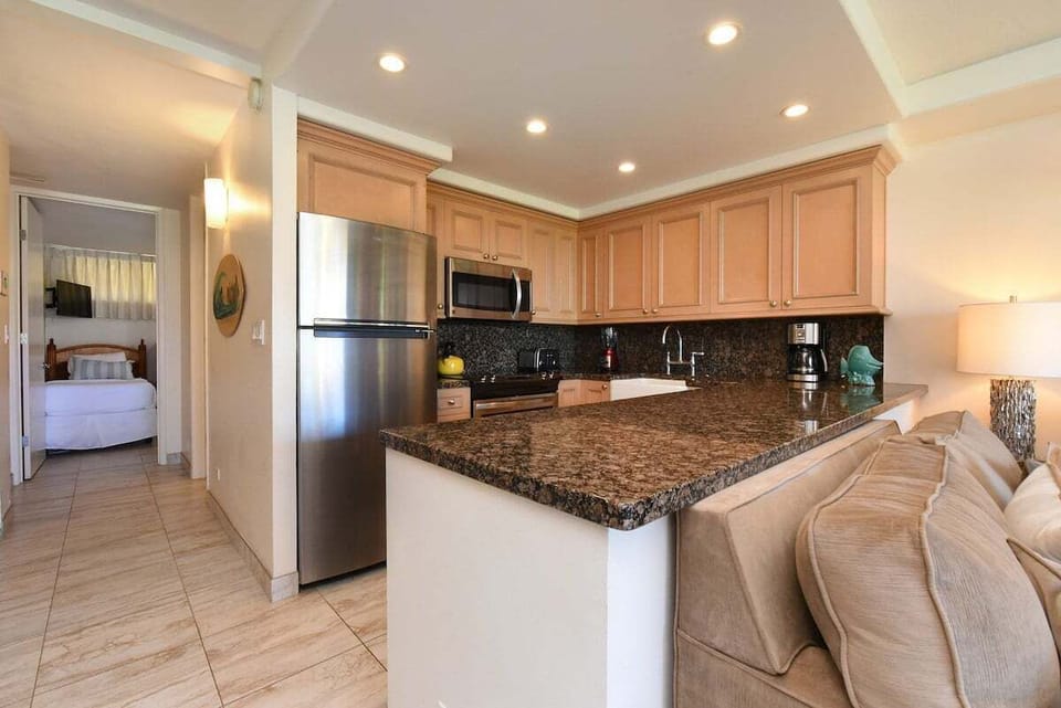 Cook with flair in kitchens of granite and steel.