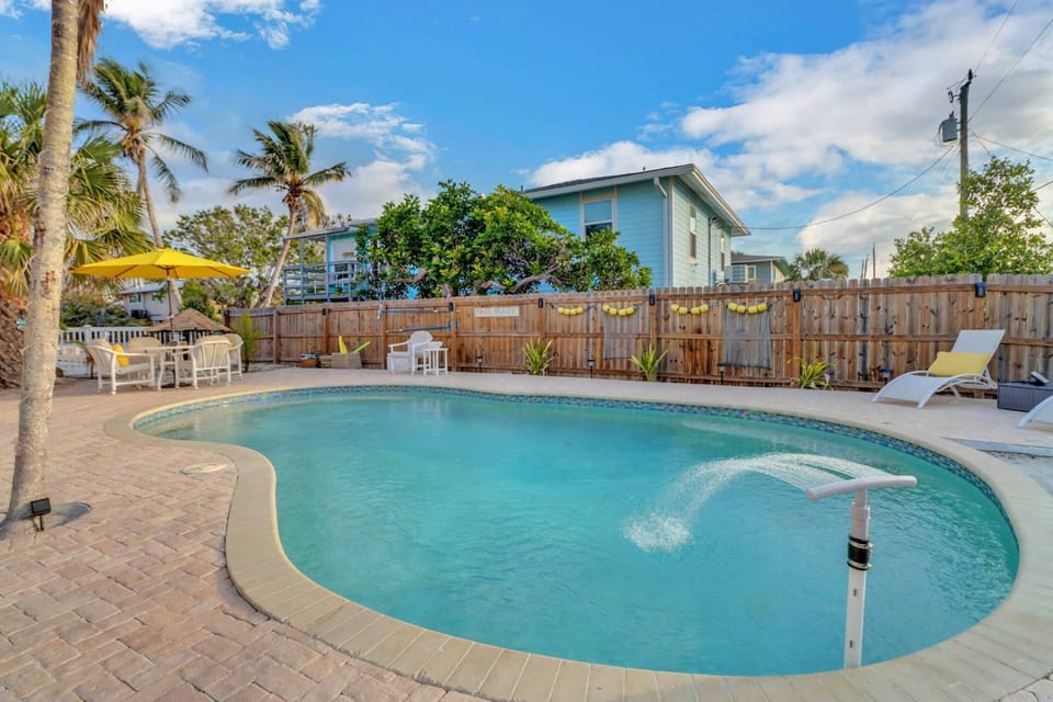 The Gulf is just a short walk away, but this may become your favorite place to unwind (Pool is unheated and shared w/owners when they are on property)