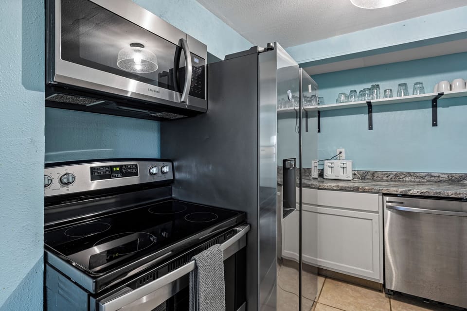 Full-size stove, refrigerator, and everything you need to cook a Gulf Coast meal.