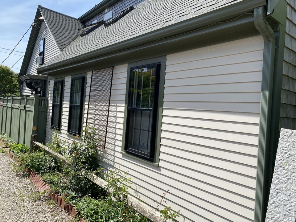 Side of unit facing Lovetts Ct, lots of windows!