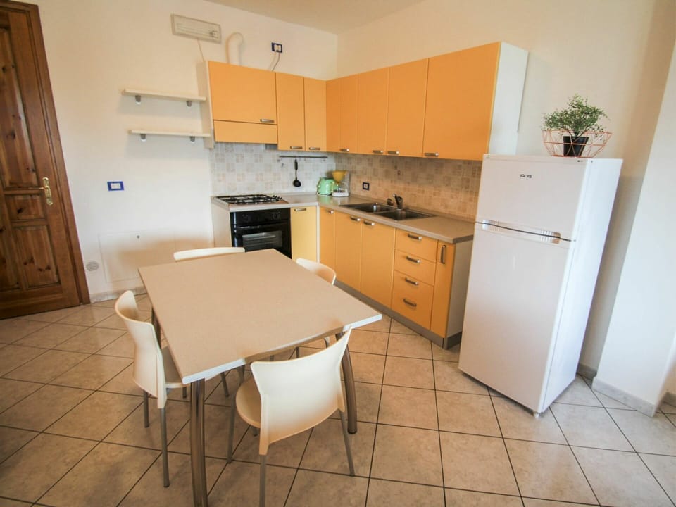 Cabinetry, Countertop, Furniture, Building, Kitchen Appliance, Drawer, Wood, Kitchen Stove, Kitchen, Interior Design