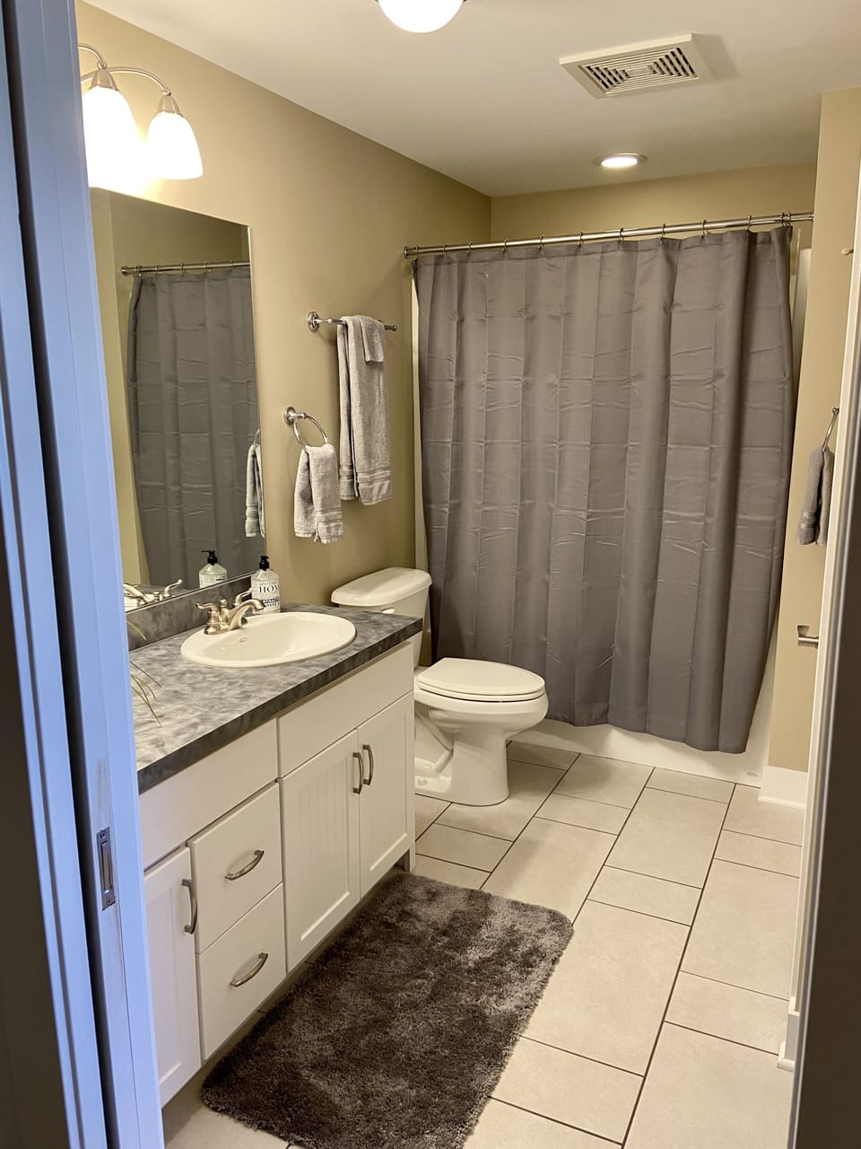 Full bathroom with shower attached to the bedroom.