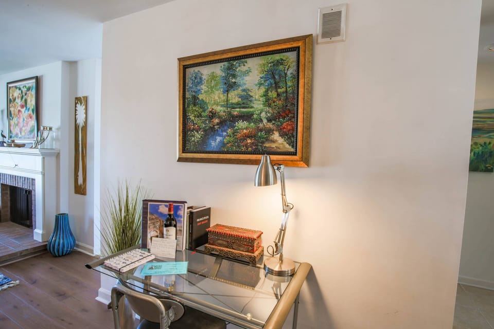 There is a desk and dedicated workspace in the home.