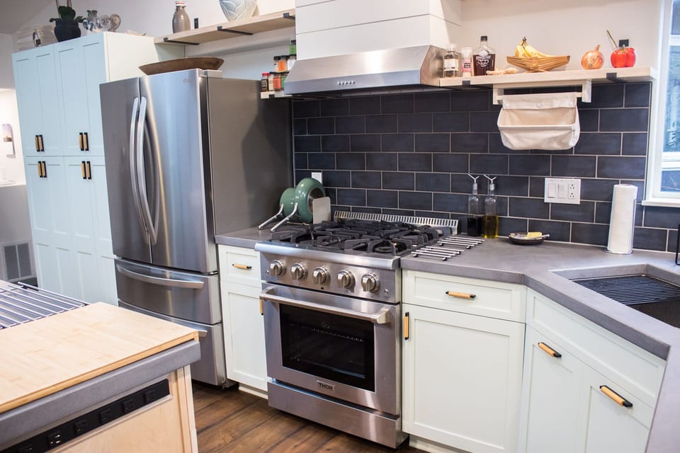 Fully stocked kitchen with microwave built into the island.