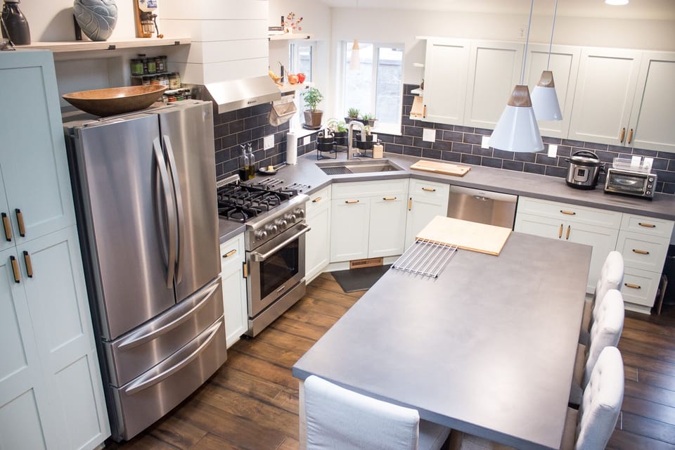 Fully stocked kitchen with microwave built into the island.