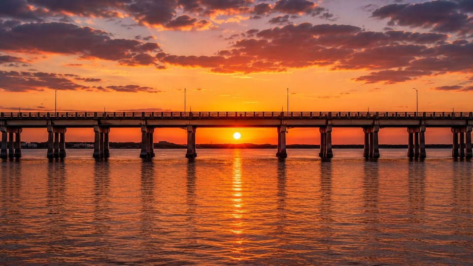 The perfect Sunset view as you come over the bridge that takes you into Emerald Isle.