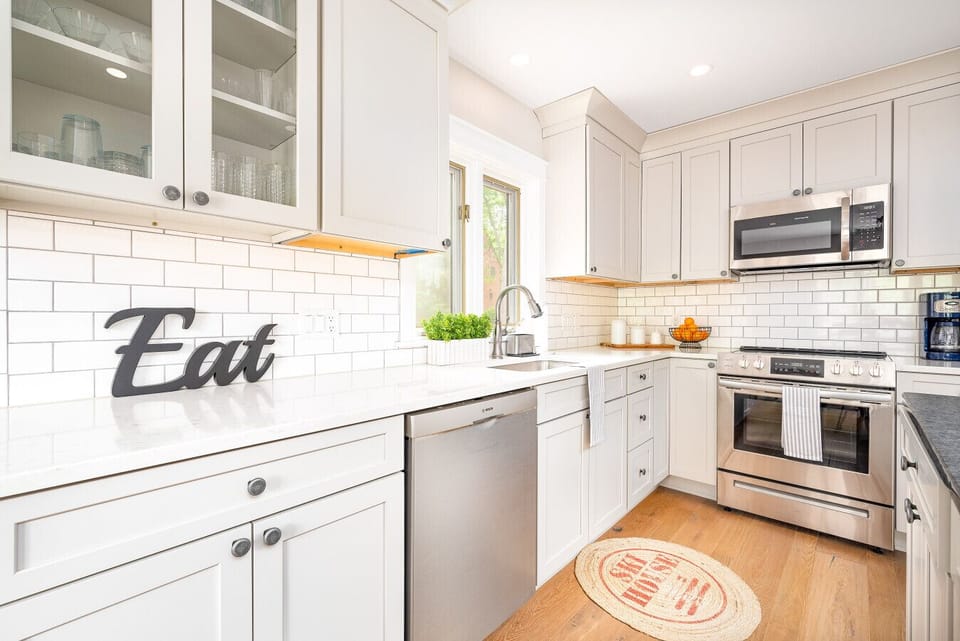 Effortless Elegance: Experience the timeless beauty of our simple white kitchen