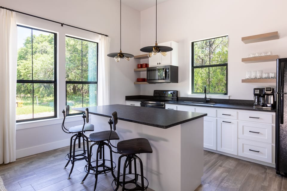 Full kitchen , stocked with basic cooking needs