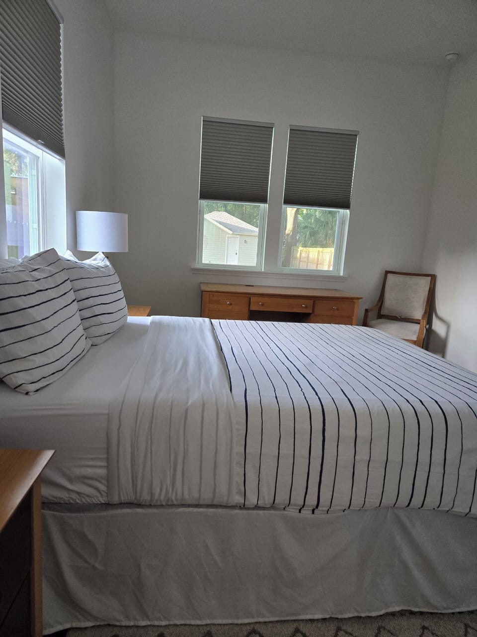 Master bedroom with a convenient workspace. Printer and paper inside closet. 