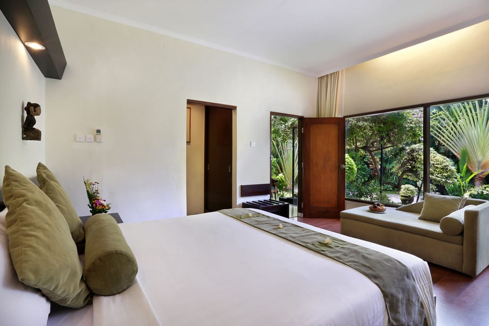Deluxe Room (Ground Floor) | Minibar, in-room safe, desk, laptop workspace
