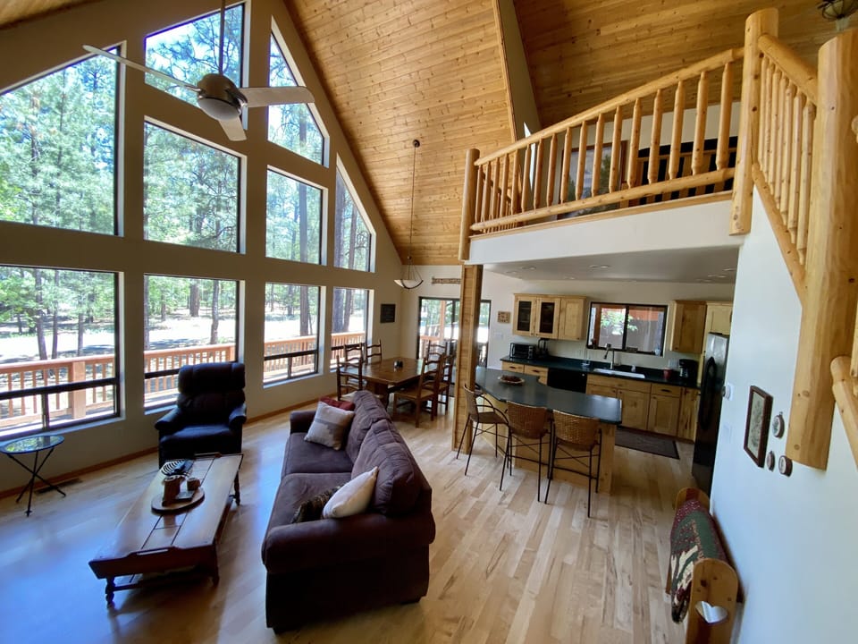Open floor plan for family fun leads to large patio and deck