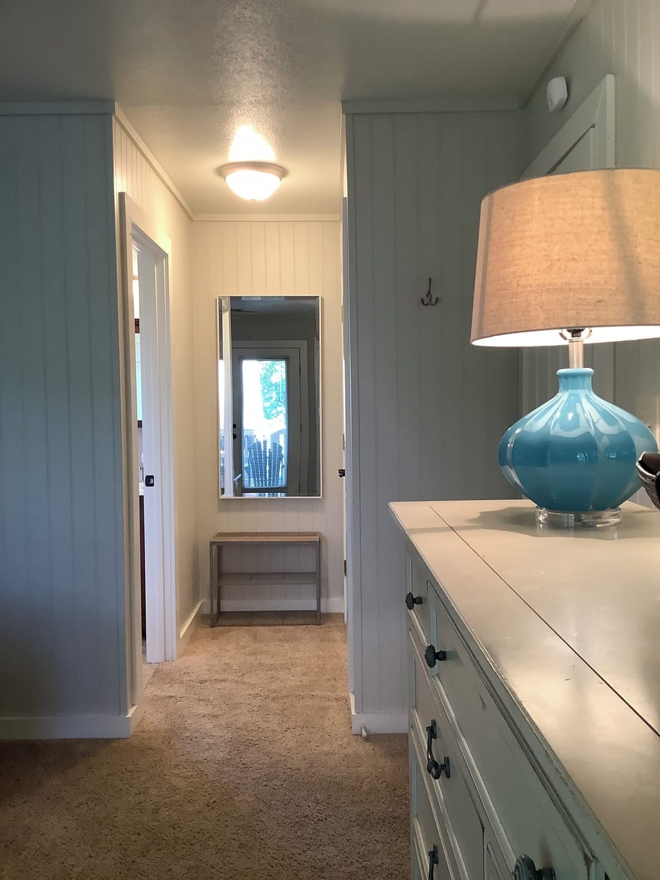 Dressing area in primary bedroom with generous closet space