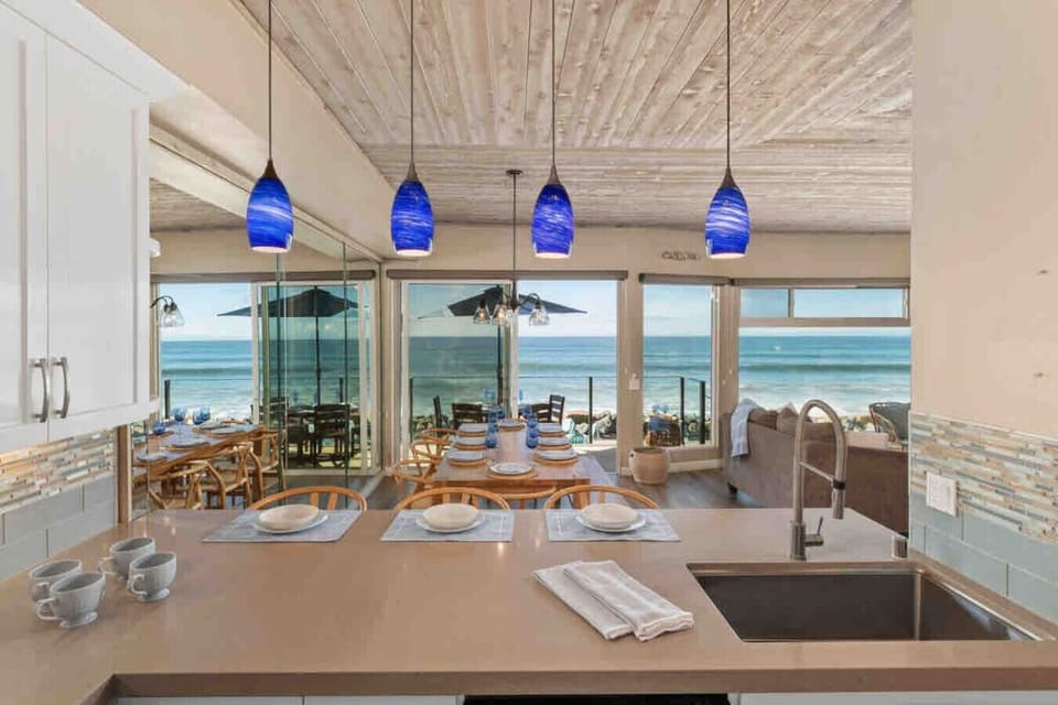 Oceanfront rental in Oceanside California, Beachfront vacation rental, Oceanside beach house, Direct beach access nearby, Private sandy backyard, Fire pit on the beach, No street between house and ocean, Walk to Oceanside Pier, Walk to restaurants and cof