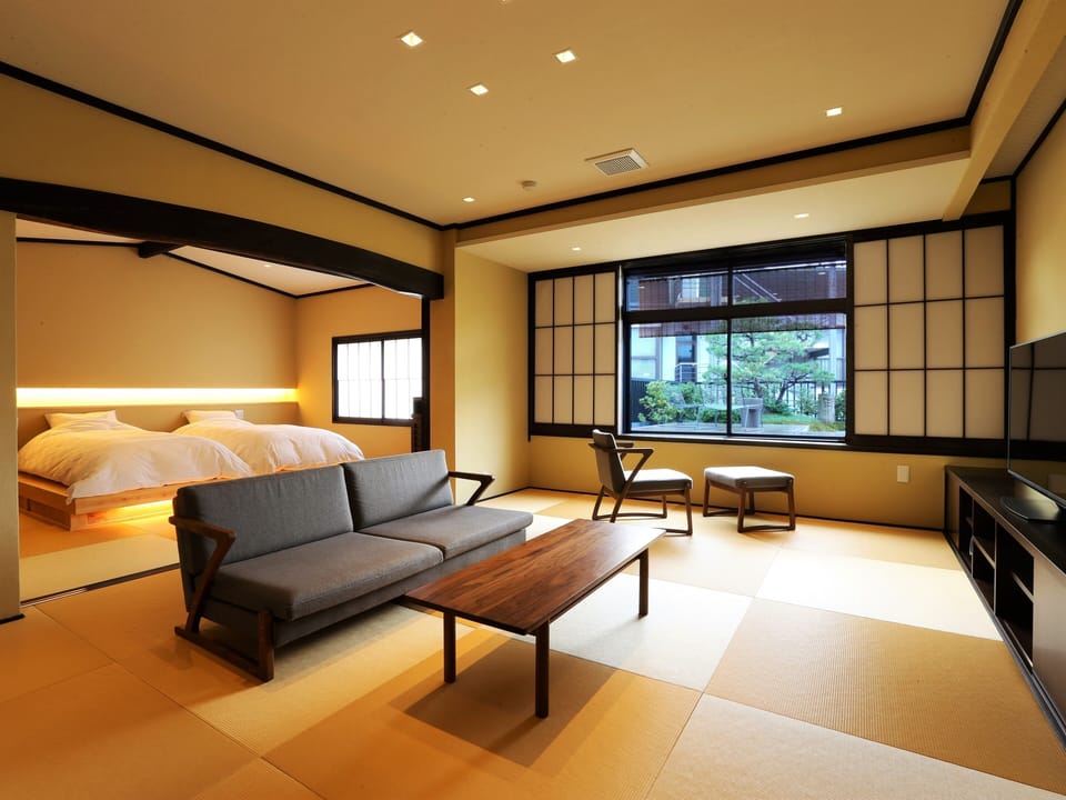 Deluxe Suite, Terrace, Garden View | Down comforters, in-room safe, WiFi (free), bed sheets