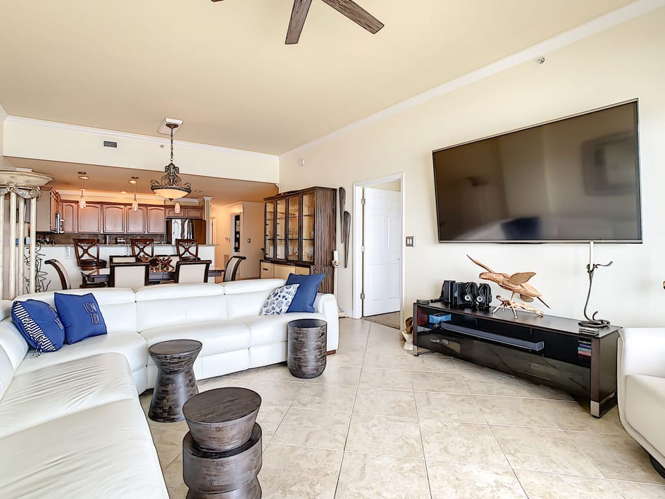 Living room with sectional and TV