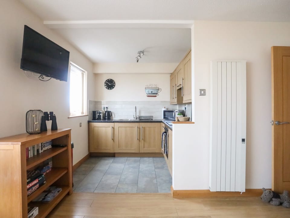 Fridge, electric kettle, toaster, cookware/dishes/utensils