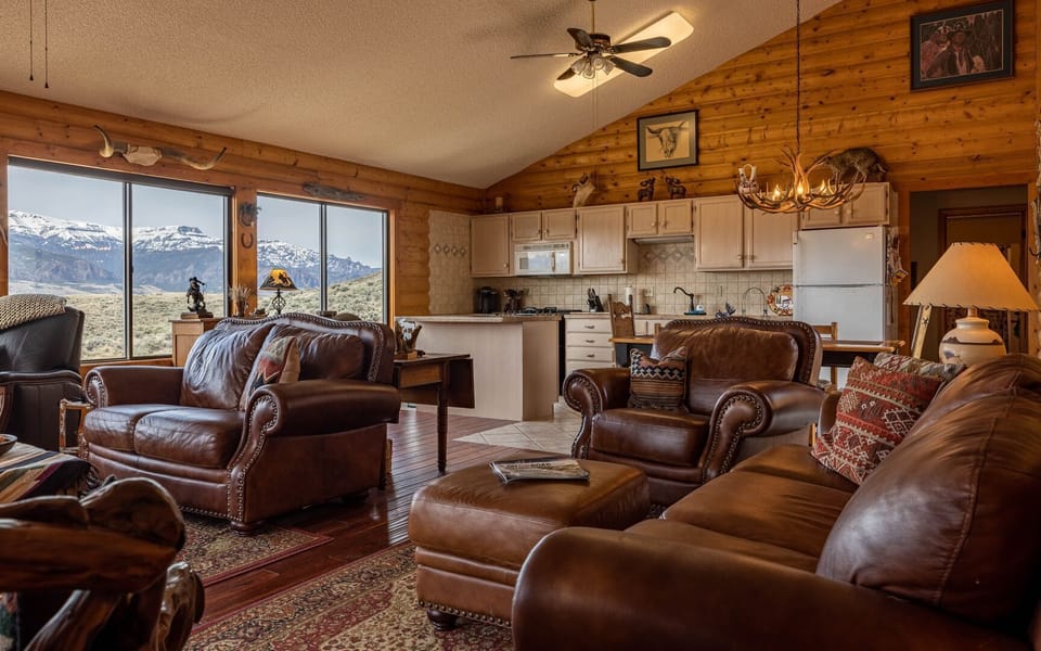 The open living, dining and kitchen has room for your group to gather together and make memories