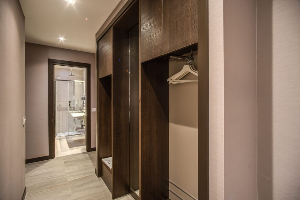 Superior Room | Bathroom | Shower, rainfall showerhead, hair dryer, bathrobes