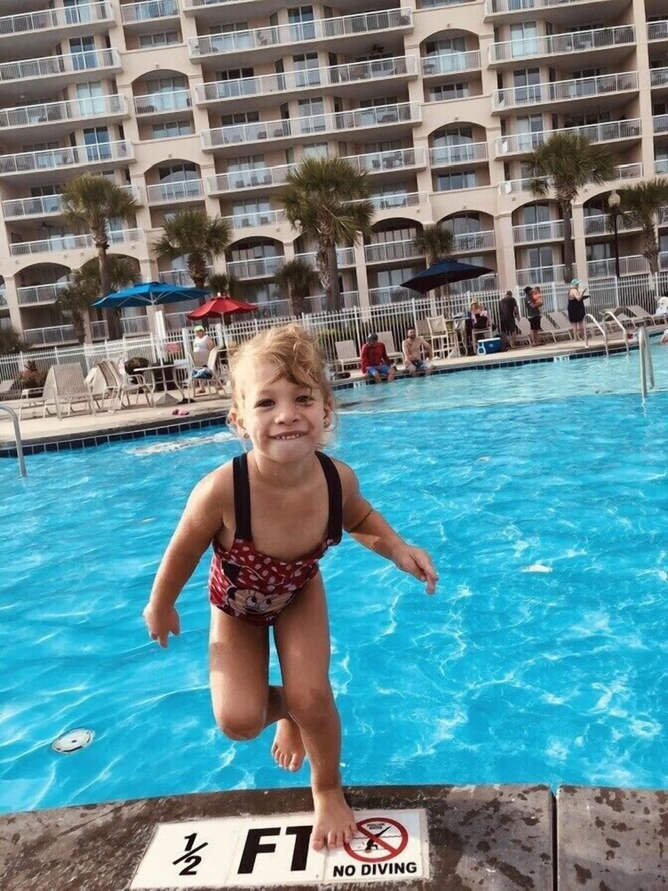 Sophia enjoying our beautiful pool