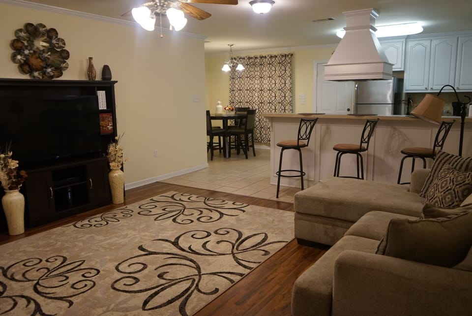 TV with view of Dining Room and Kitchen