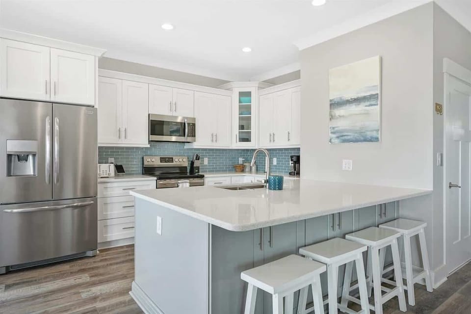 Large open kitchen with bar seating