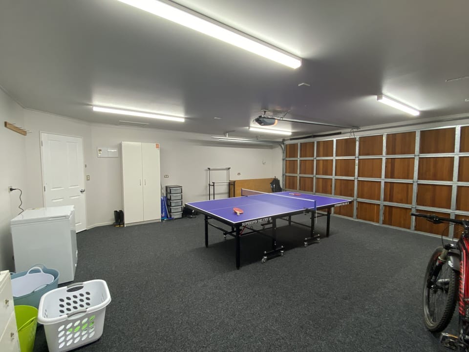 Table tennis table, freezer and washing machine and utility sink