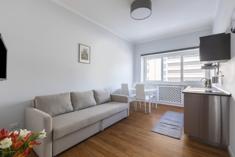Deluxe Studio Suite | Living area | Flat-screen TV