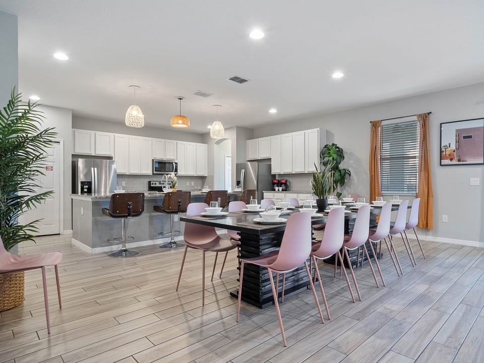 - Large dining table seats your entire group together  
- Fully equipped kitchen with stainless appliances  
- Open bright layout perfect for shared family meals