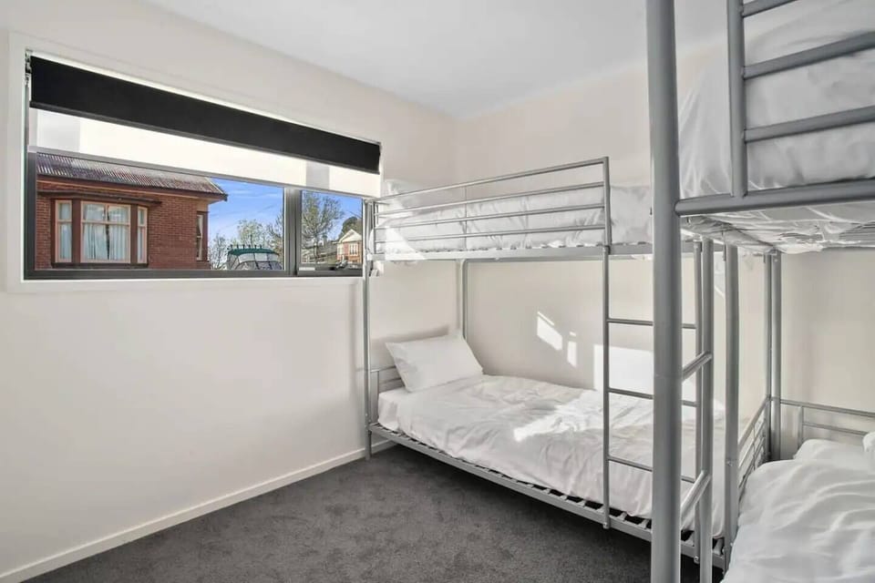 Comfortably set up for the family or travelling friends, the third bedroom sleeps four in a set of bunk beds, single bed and trundle. 