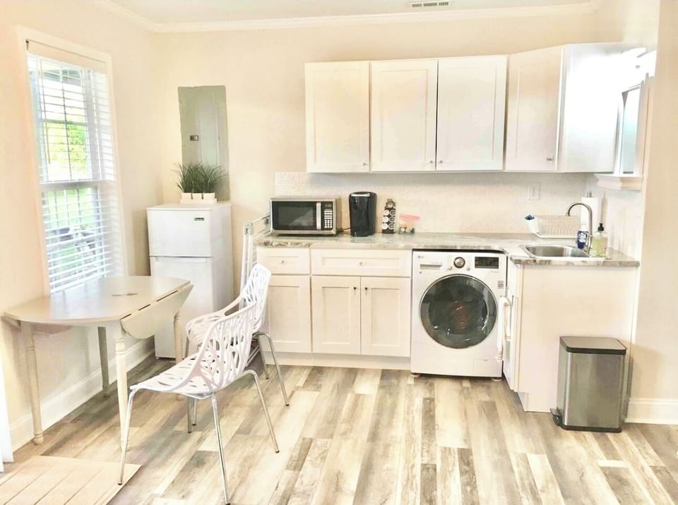 Mini fridge, kitchen counter.