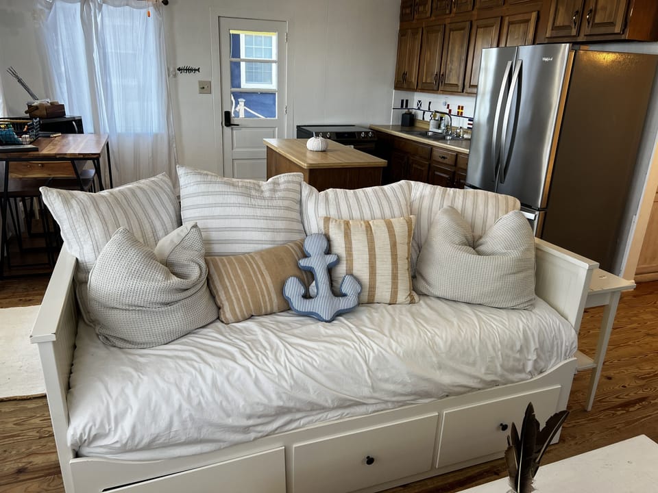 Our day bed pulls out into a king size bed.
