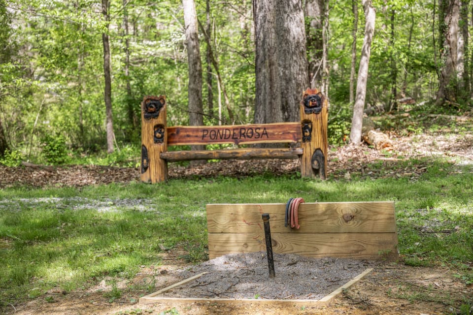 Take a break on the custom Ponderosa bench next to the game area