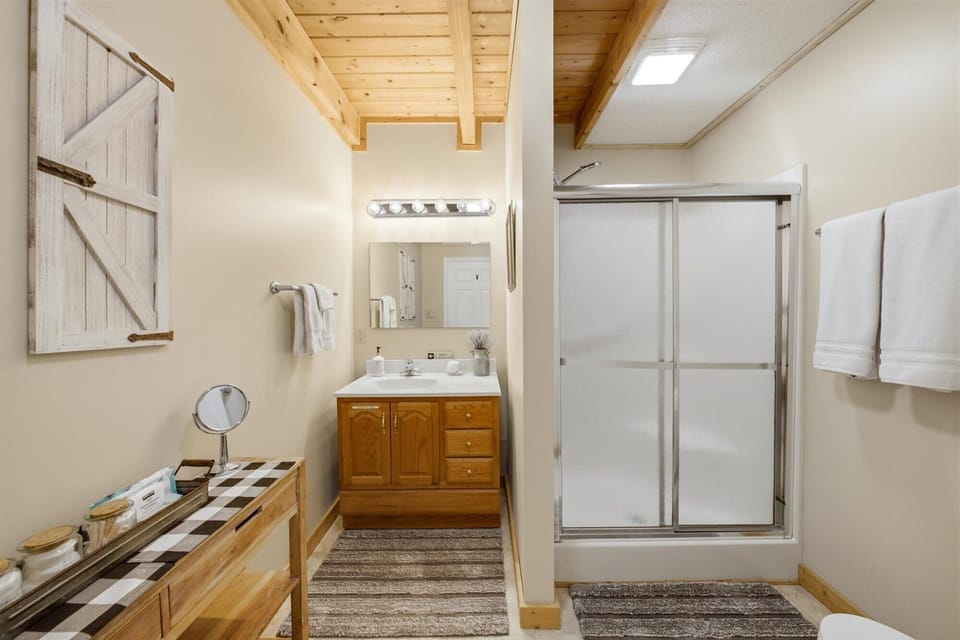 Main floor bathroom w/shower.  Soaps, shampoo/conditioner, q-tips, makeup wipes.