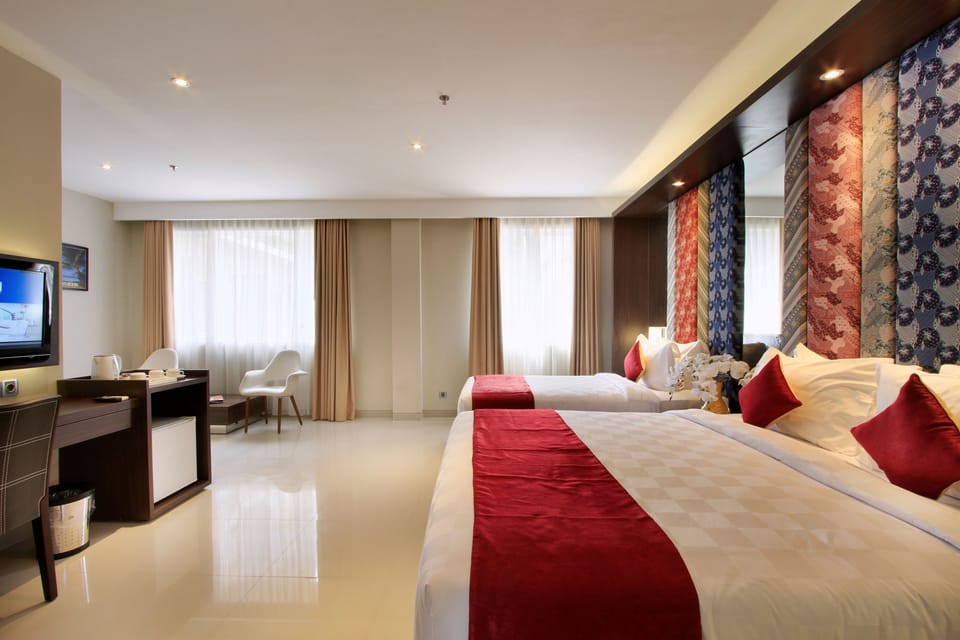 Family Suite | Premium bedding, minibar, in-room safe, desk