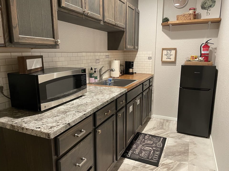 Kitchenette comes with many small appliances.
