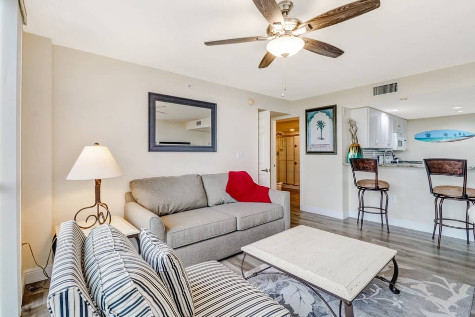 The bathroom is conveniently accessible from the main living space and bedroom through 2 separate sets of doors.