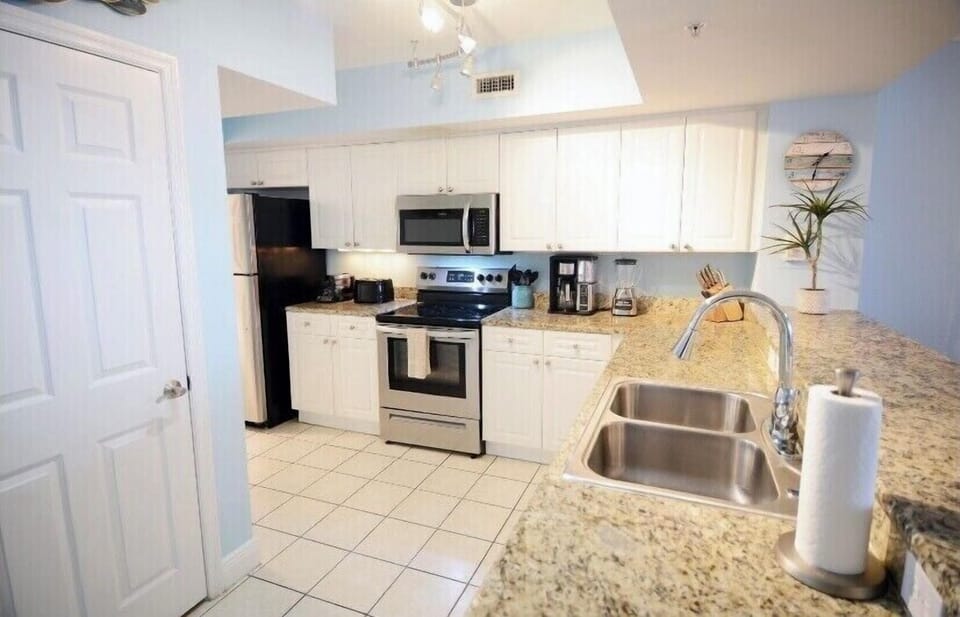 Enjoy preparing meals in this Gourmet Kitchen with top end appliances 
