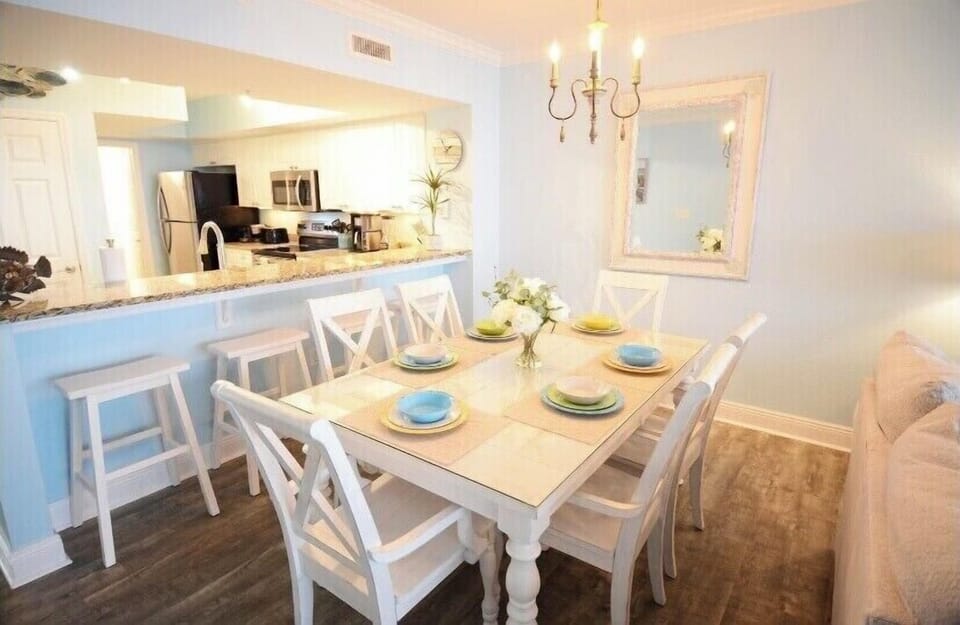 Dim the lights and enjoy a relaxing dinner at home in the dining area