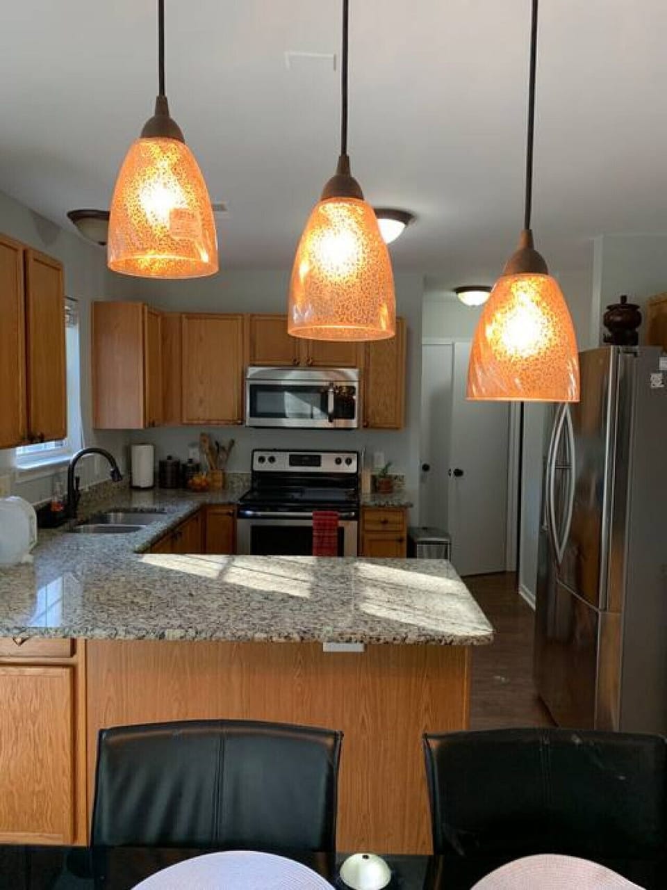 Granite counters, a full dining table, and everything you need to feel at home.