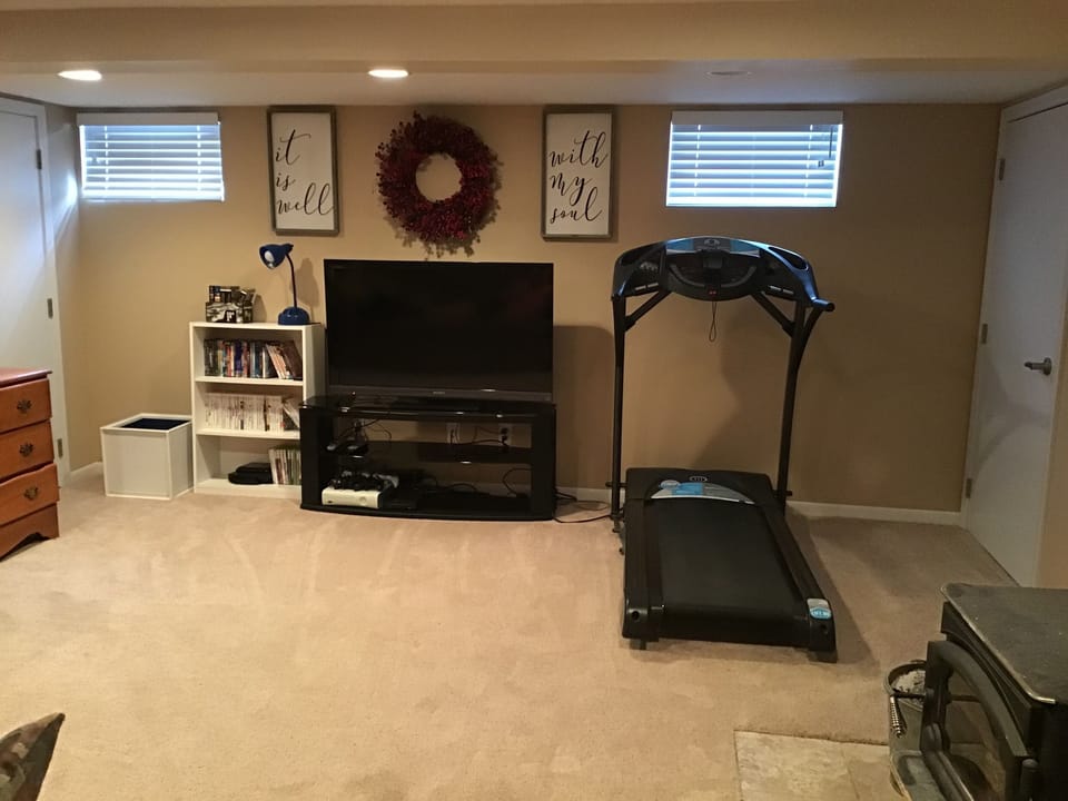 Downstairs living space with couch