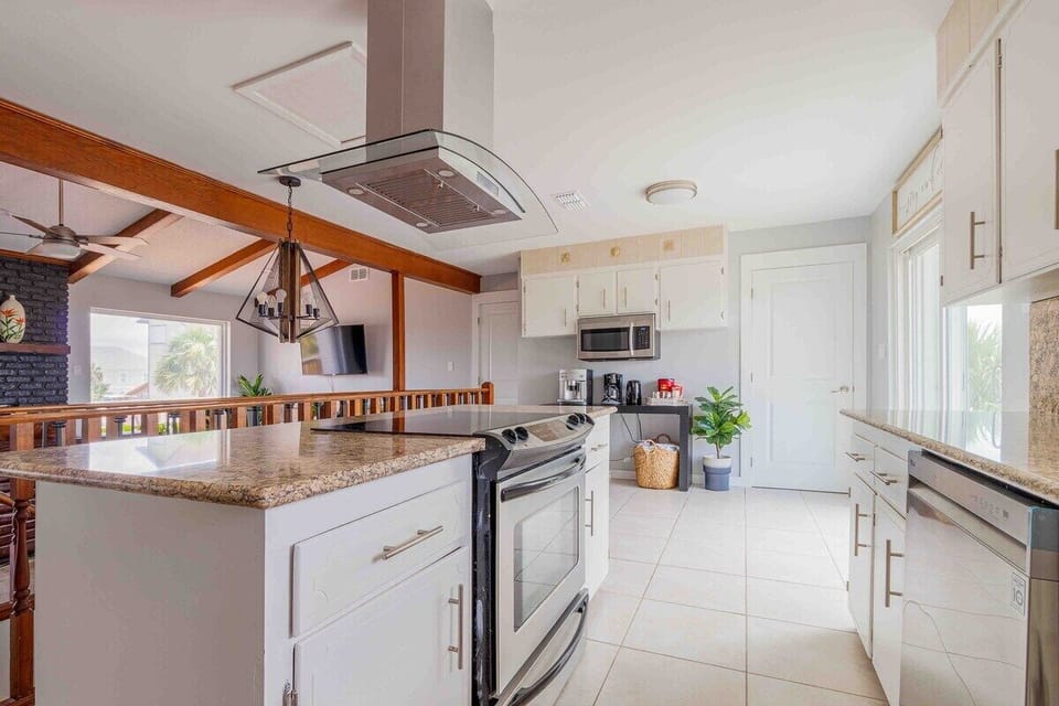The massive kitchen invites you to enjoy upscale entertaining, complete with stainless steel appliances, granite countertops and a fully loaded kitchen experience: