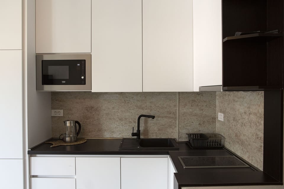 Full size fridge with freezer, stove top, kitchenware are just few benefits