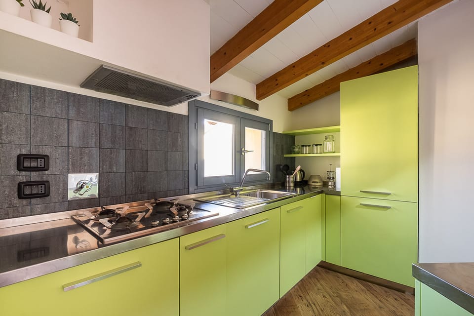City Condo | Private kitchen | Full-size fridge, microwave, oven, stovetop