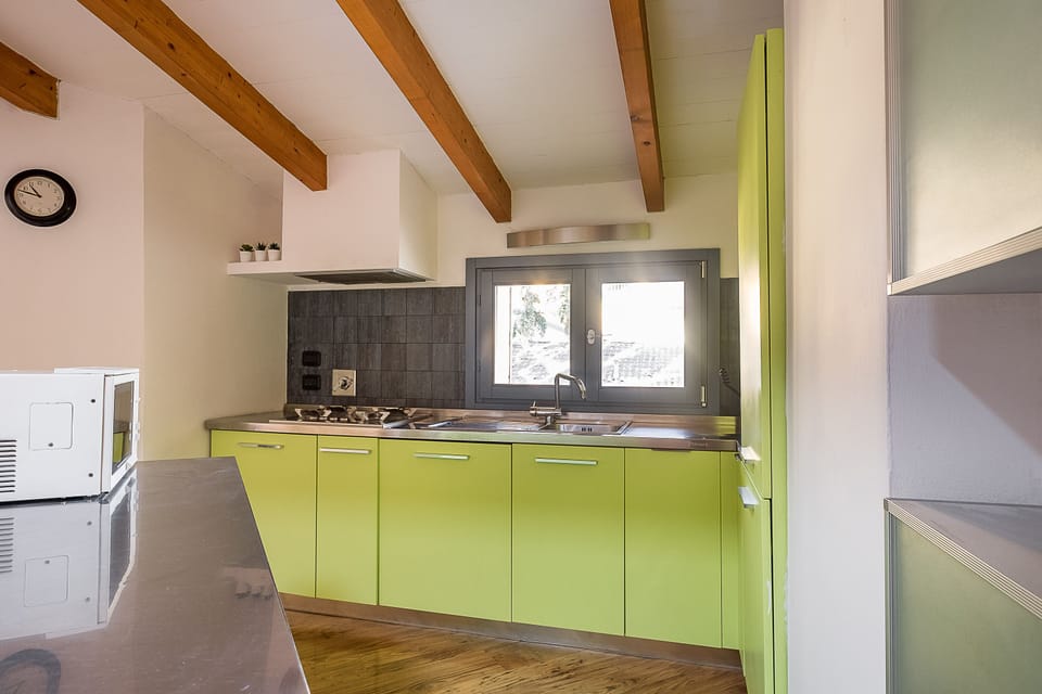 City Condo | Private kitchen | Full-size fridge, microwave, oven, stovetop