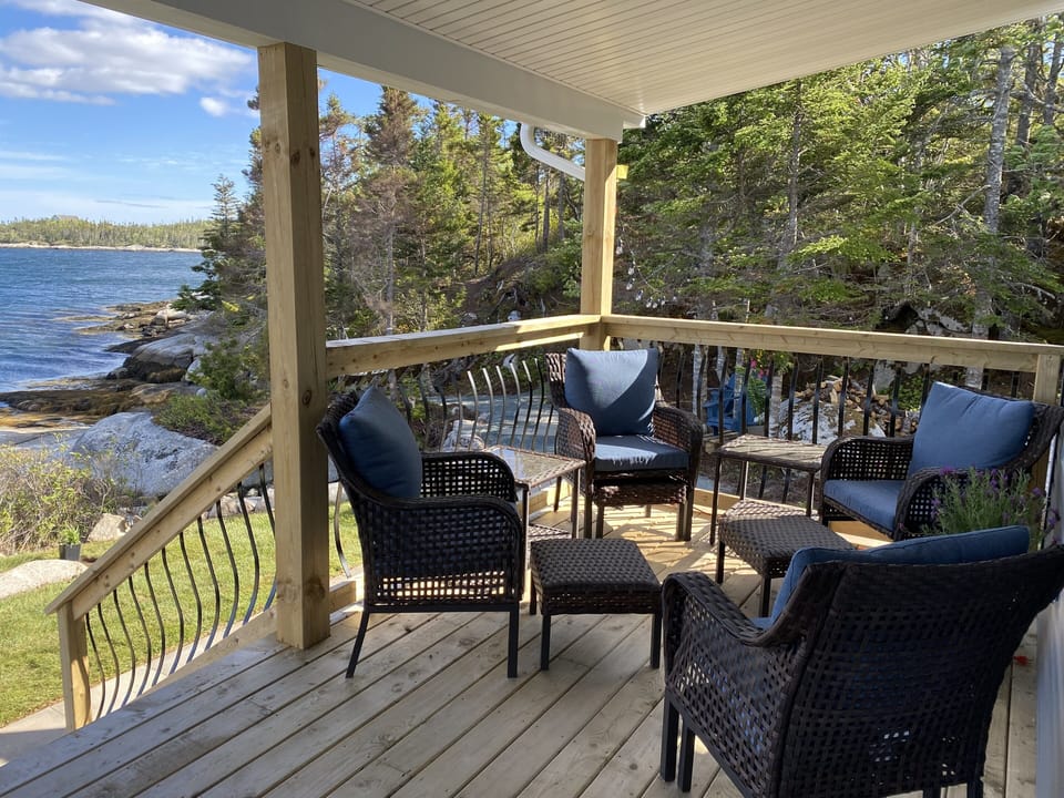 The front porch is a great spot for your morning coffee or evening drink!