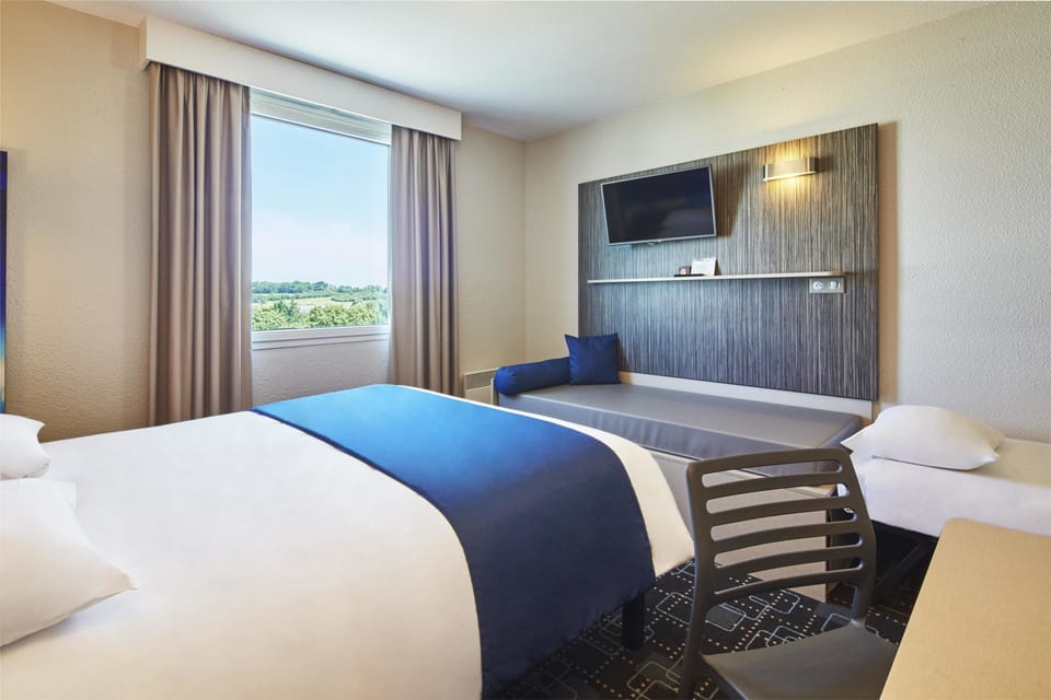 Desk, blackout drapes, soundproofing, iron/ironing board