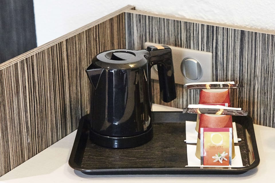 Desk, blackout drapes, soundproofing, iron/ironing board