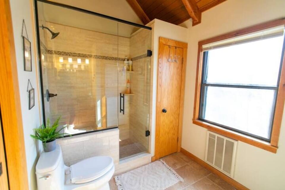 Renovated bathroom. Body soap/shampoo/hand soap/towels provided. Washer/dryer & laundry detergent