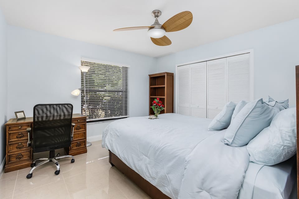 Guest bedroom #2 has a Queen bed & a desk